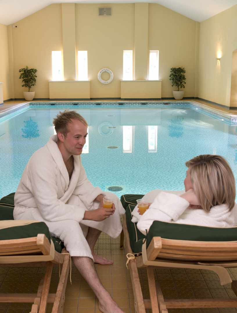 Couple by pool Couple by pool